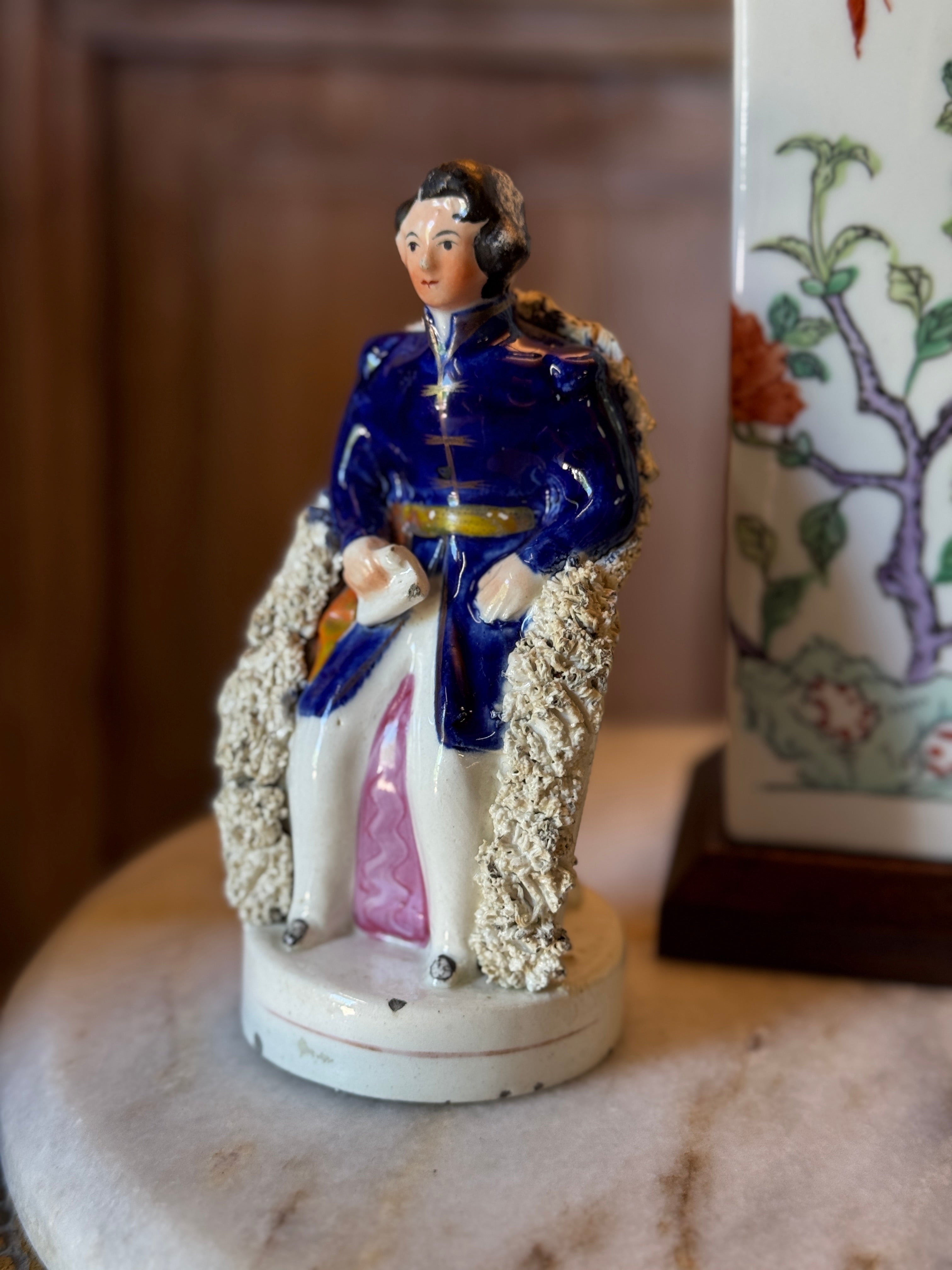 Antique Staffordshire Figurine – Seated Gentleman in Blue Coat