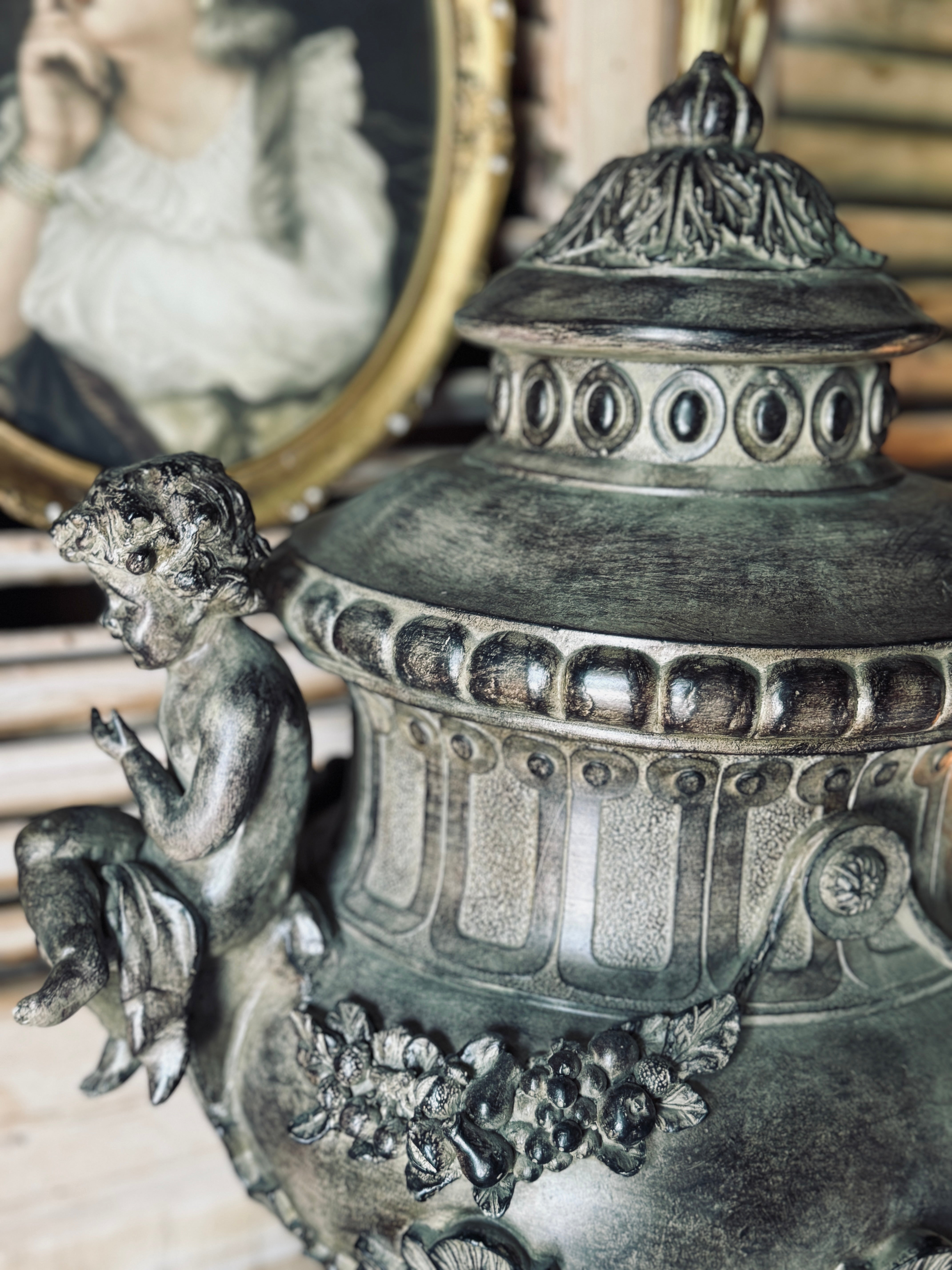 Aged Cherub Urn