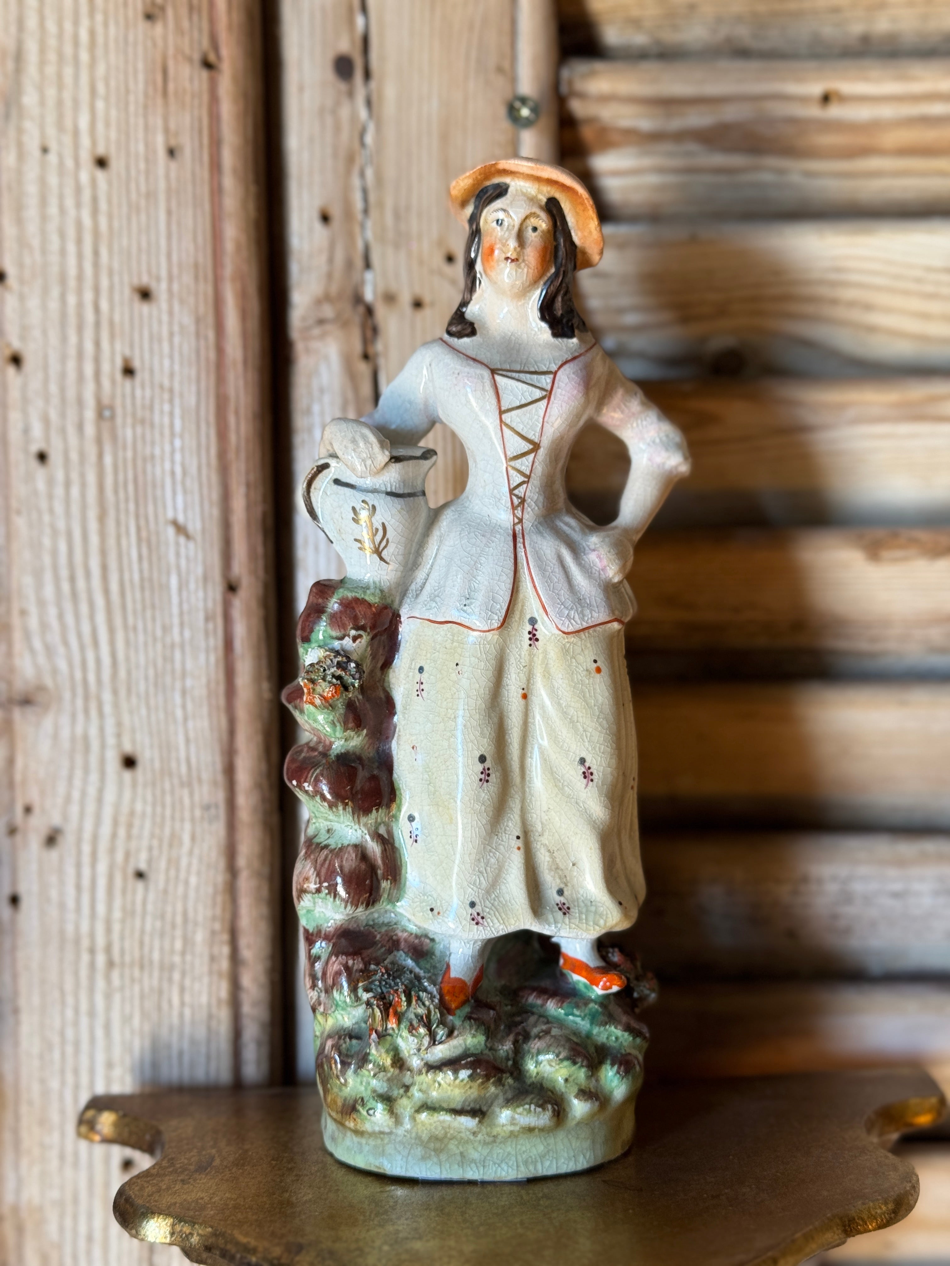 Antique Staffordshire-Style Figurine – “Lady With Watering Can”