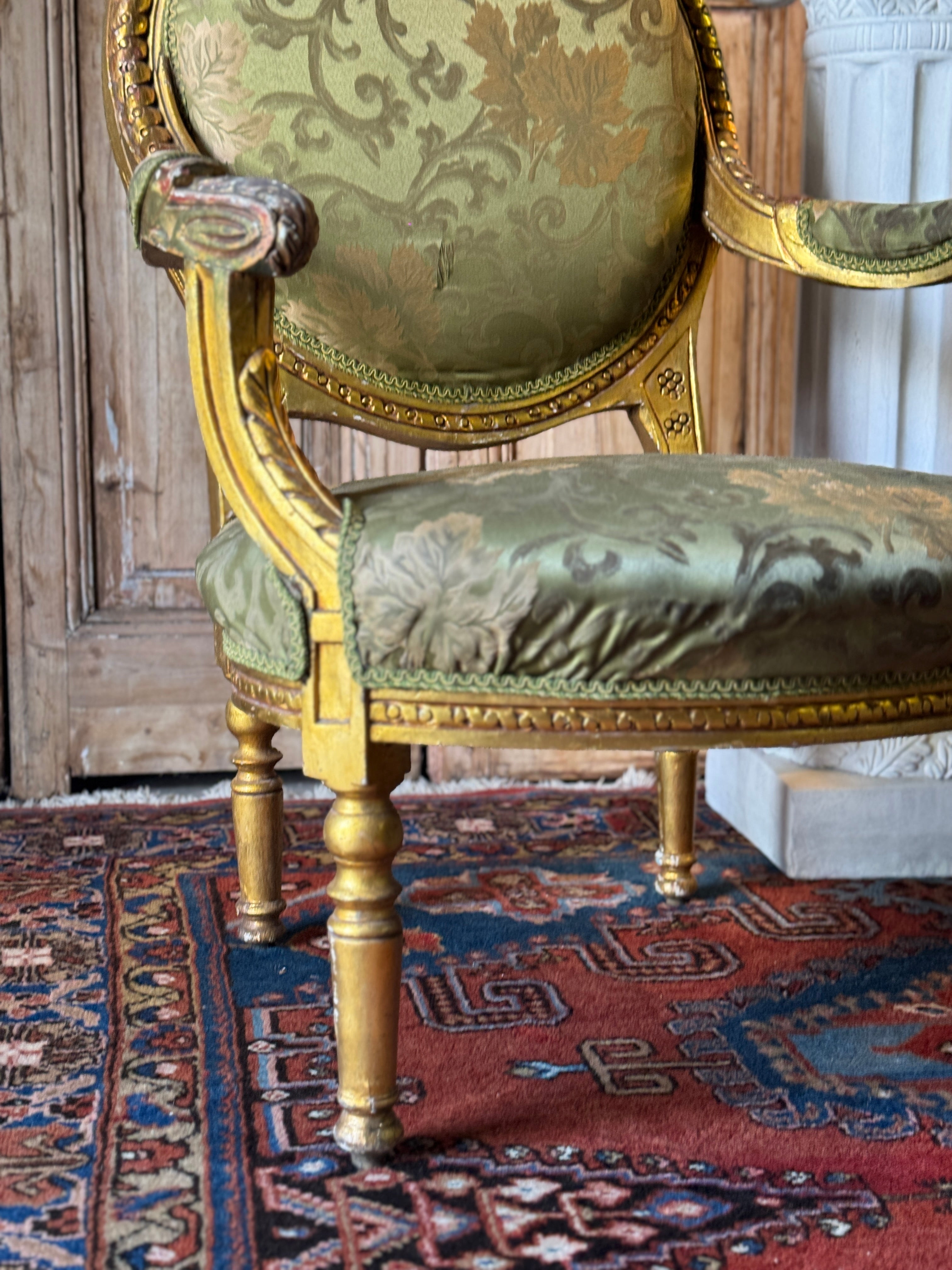 Pair of Gilt Louis XVI Style Armchairs with Original Green Floral Upholstery