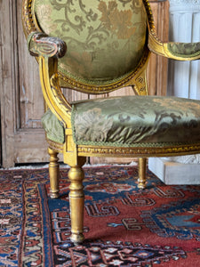 Pair of Gilt Louis XVI Style Armchairs with Original Green Floral Upholstery