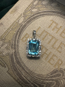 Cocktail Emerald Cut Topaz Pendant